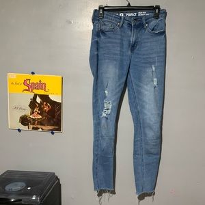 Distressed high rise skinny jeans